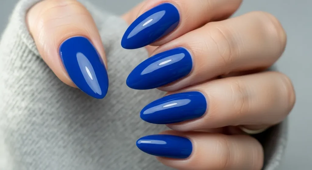 A hand show full cover blue nails.